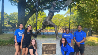 Seton Hall education students in front of Althea Gibson's statue in Branch Brook Park in Newark.