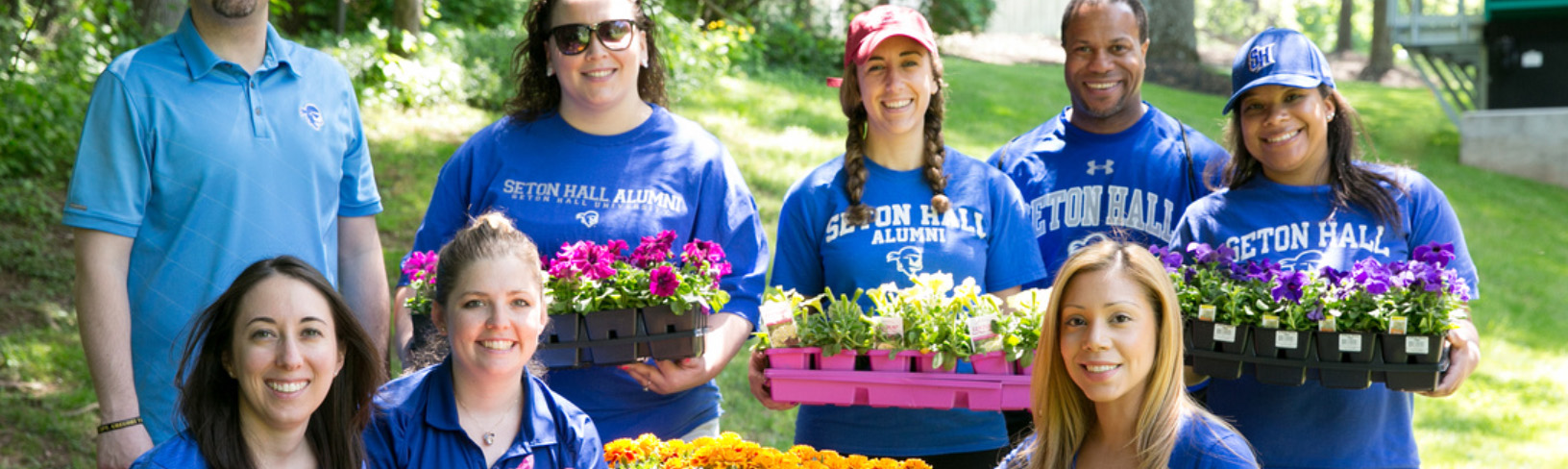 Seton Hall Community Members Volunteering at a Flower Garden