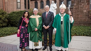 Following Mass, Monsignor McCarren was greeted by many well wishers, among them, Archbishop Joseph Tobin, Interim President Katia Passerini, and Interim Provost Erik Lillquist.